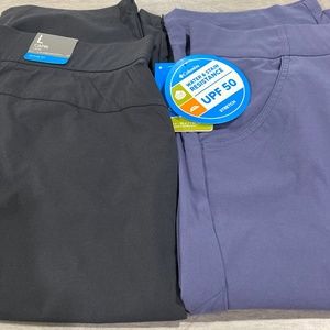 Two pair Columbia capris.  Black and periwinkle blue size large